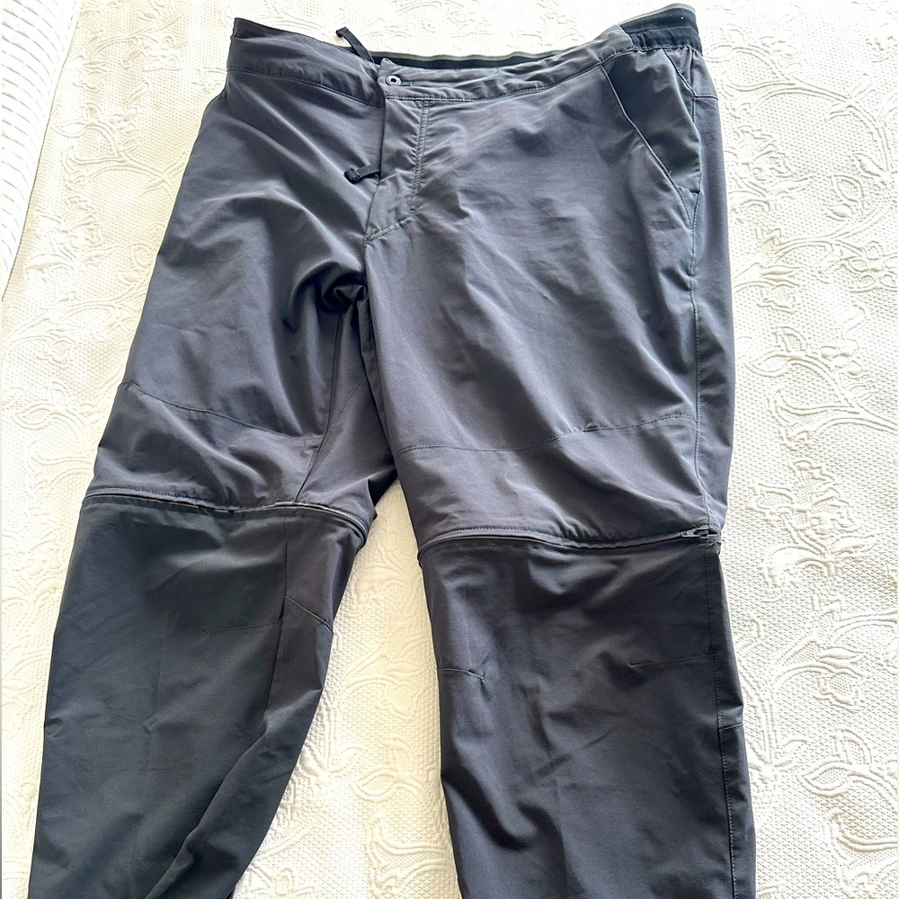 Dark gray convertible North Face hiking pants.